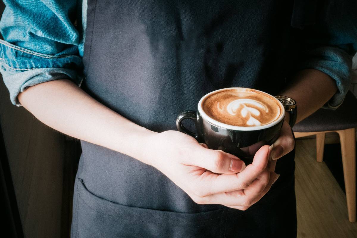 Barista showing an espresso