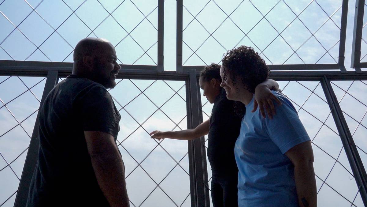 Family enjoying view from CN Tower observation deck