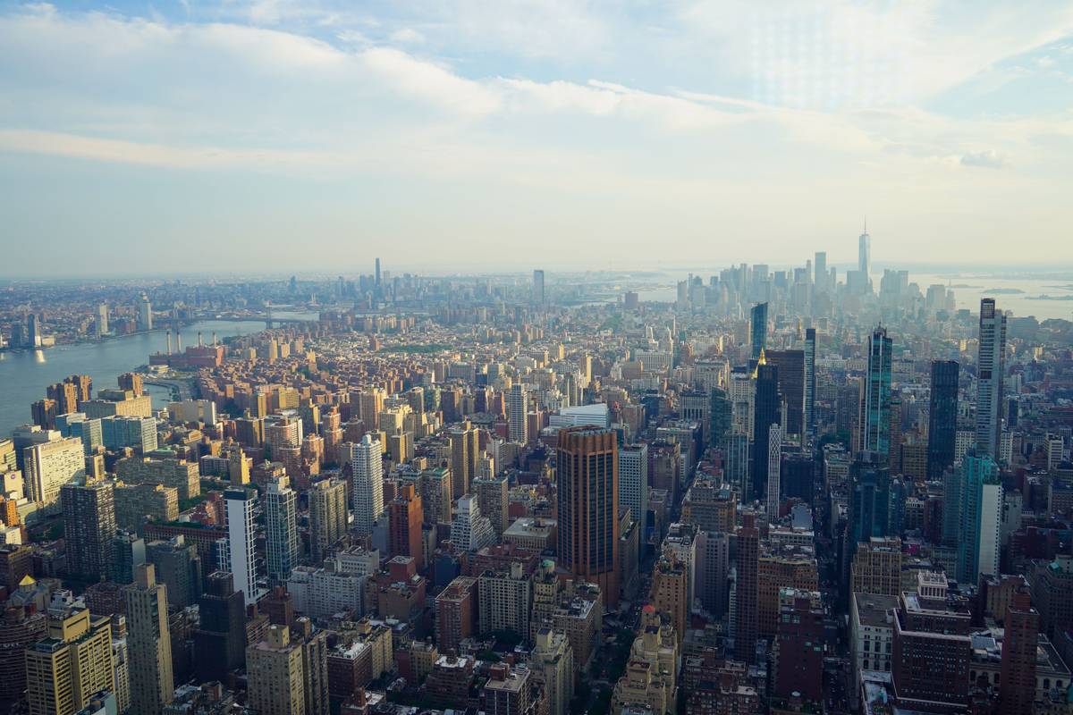 View from Summit One Vanderbilt overlooking Manhattan skyscrapers with Central Park in the distance.