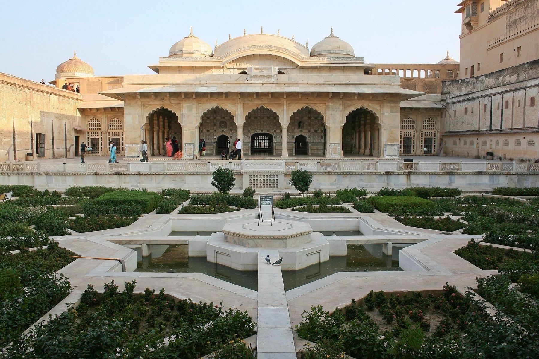 The formal garden and arched pavilion in a courtyard of Amber Fort