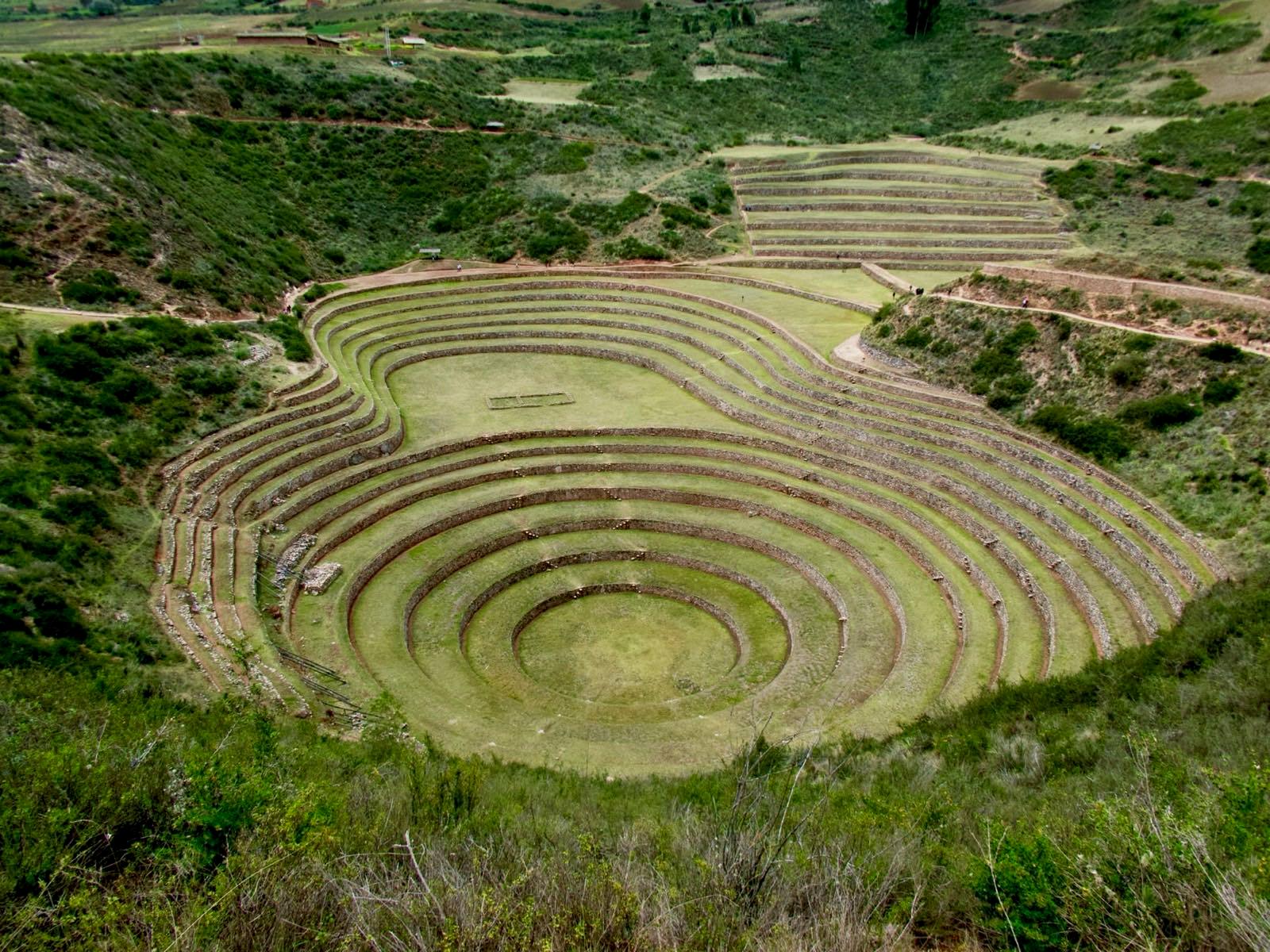 The circular Inca terraces of Moray sunk into the high plateau above the Sacred Valley