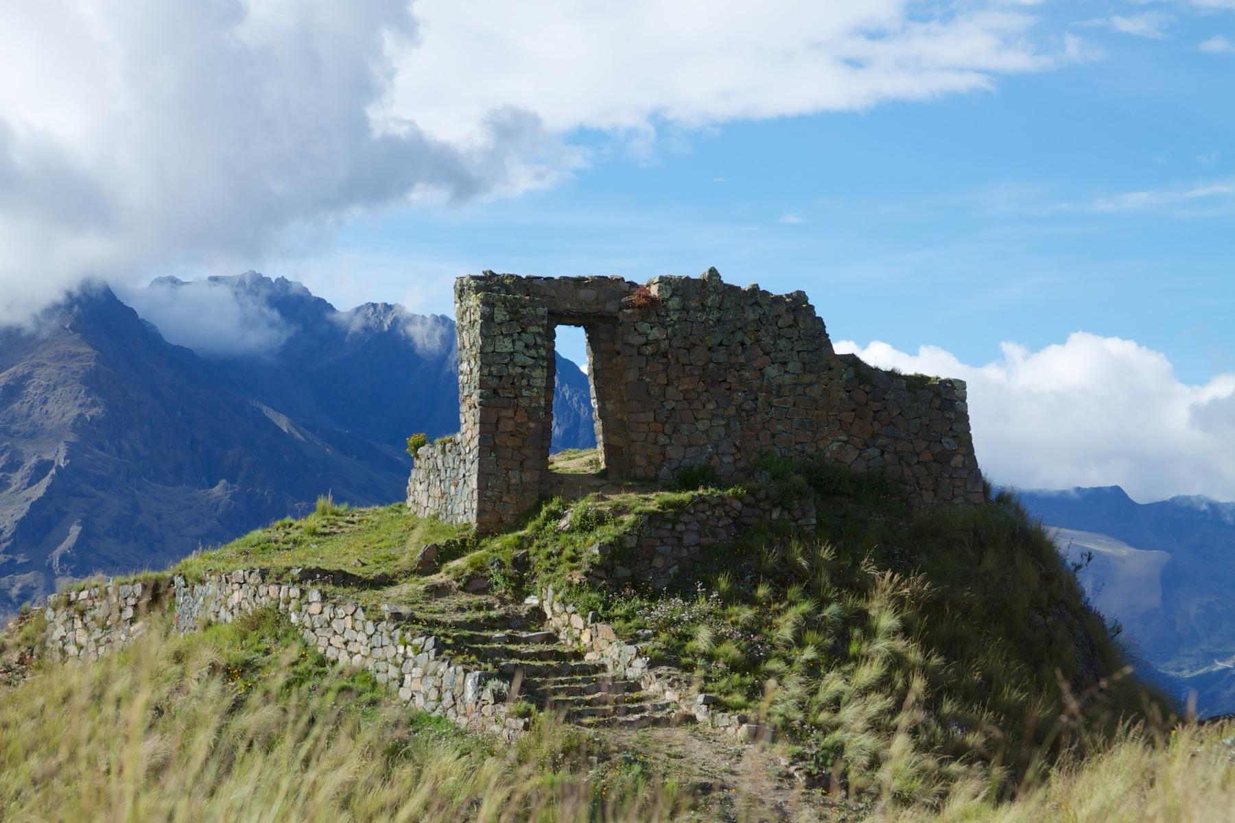 The stone doorway of Inti Punku, the Sun Gate, on a ridge above the Urubamba valley