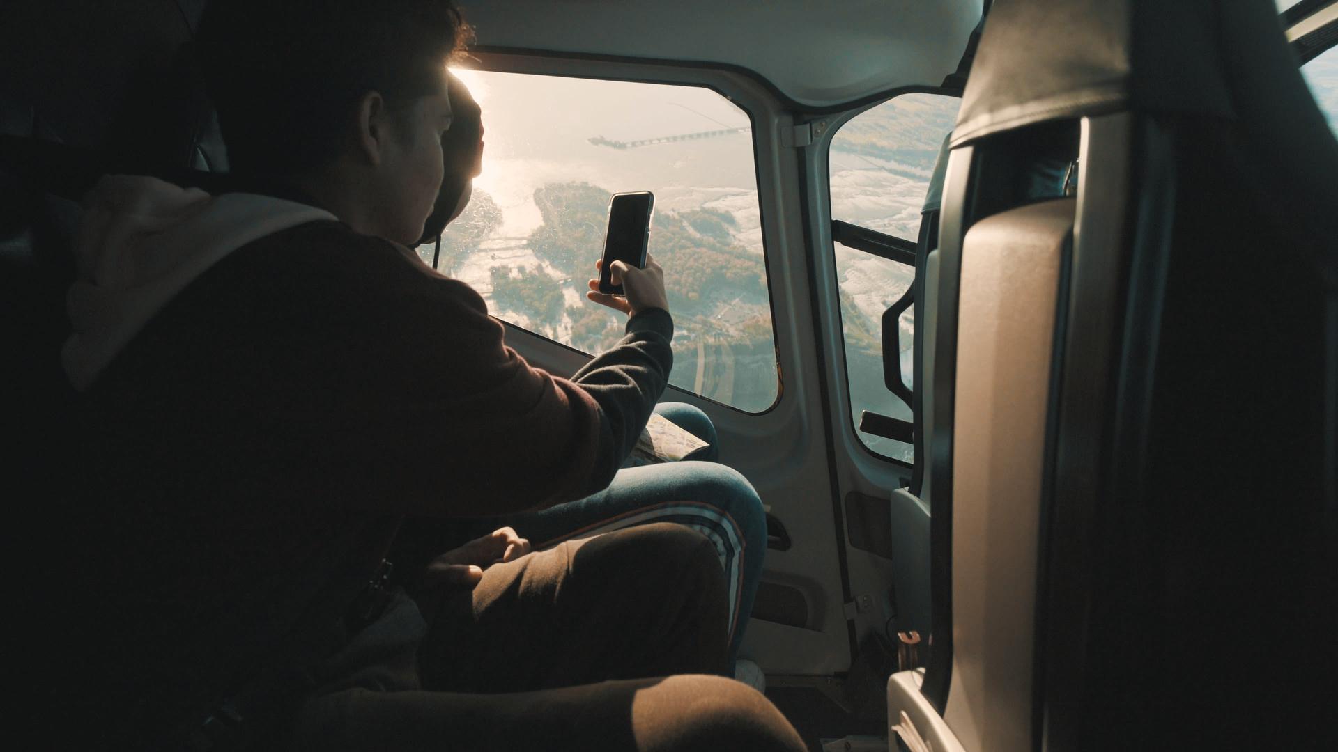 Taking a photo from a Niagara Helicopter Ride