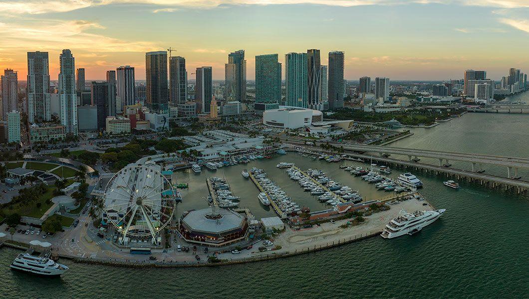 Skyviews-Miami-Observation-Wheel-at-Bayside-Marketplace-with-reflections-in-Biscayne-Bay-water.jpg