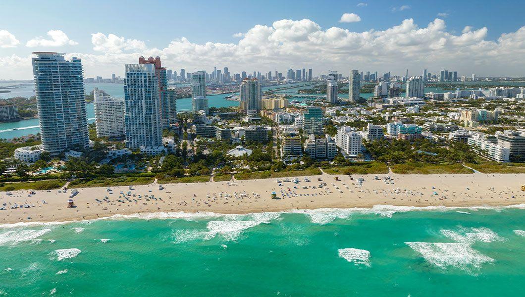 South-Beach-sandy-surface-with-tourists-relaxing-on-hot-Florida-sun.jpg