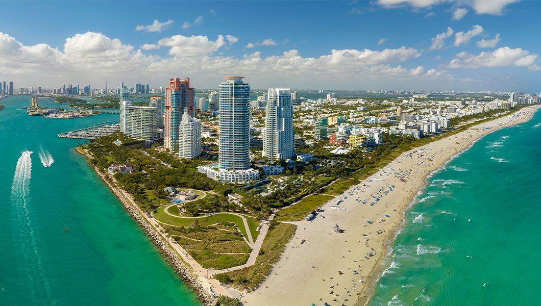 South Beach sandy surface with tourists relaxing on hot Florida sun.jpg