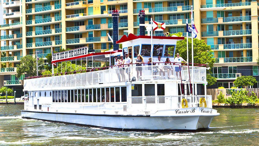 Paddlewheel-sightseeing-boat,-the-Carrie-B,-cruising-along-the-Stranahan-River.jpg