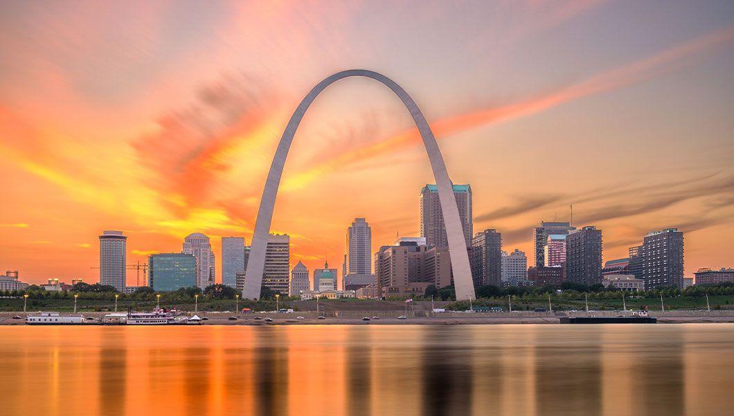 St. Louis Arch, Missouri, USA downtown cityscape on the river at dusk..jpg