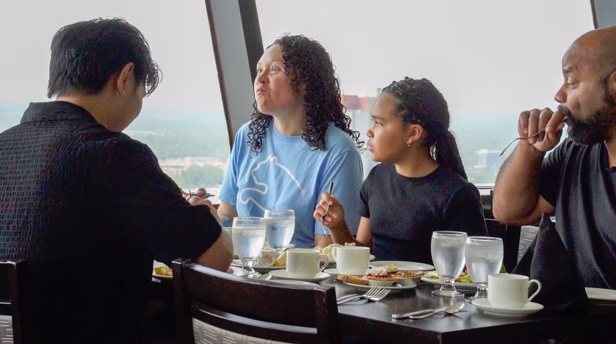 People enjoying food and View Falls Above & Behind Tour.jpg