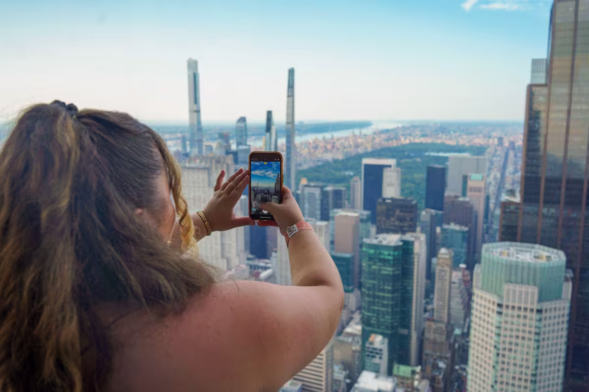 Visitor taking photo of NYC skyline on Summit Vanderbilt Tour.jpg