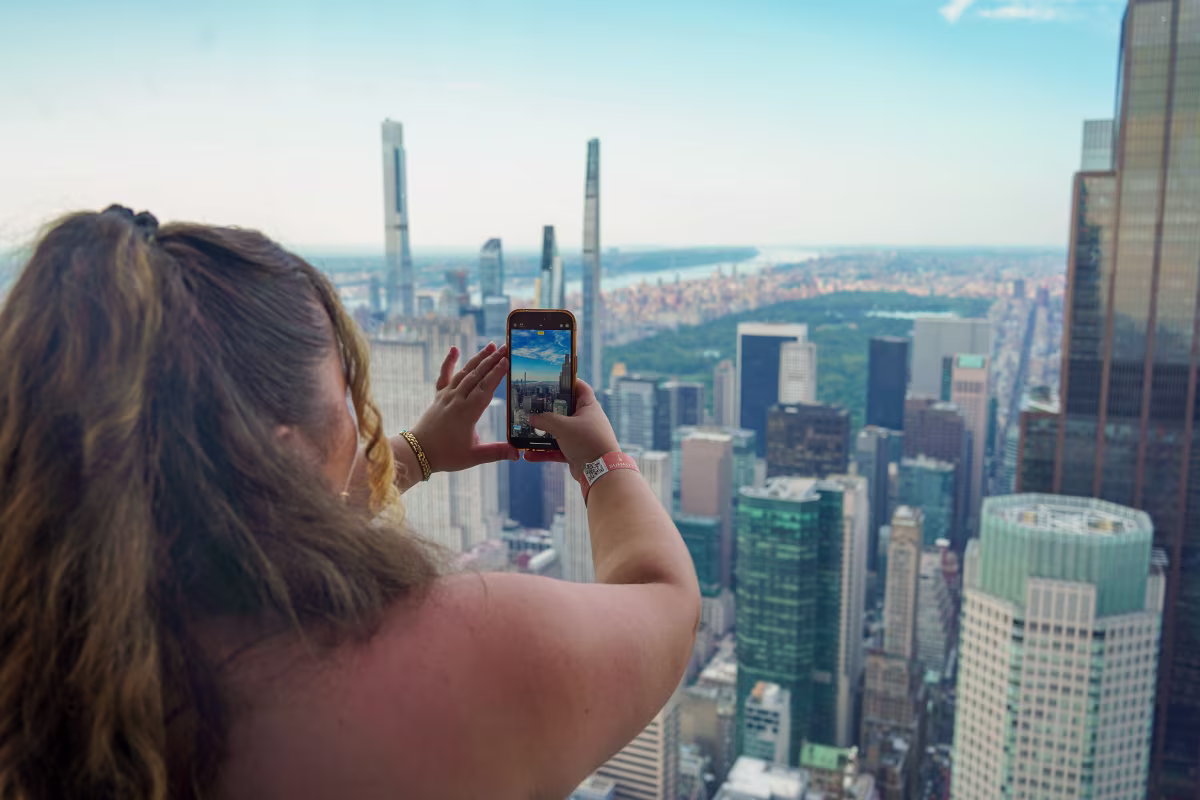 Visitor taking photo of NYC skyline on Summit Vanderbilt Tour.jpg