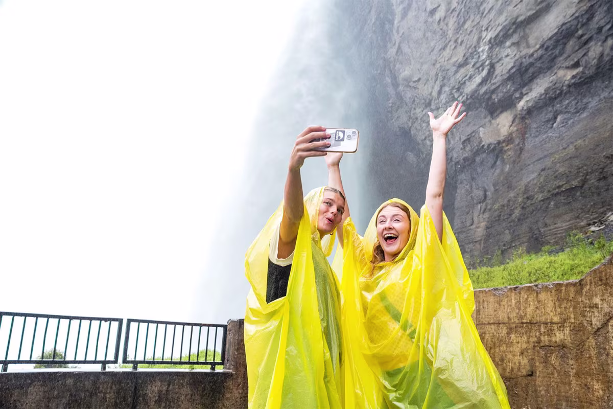 Friends Enjoying at Journey Behind the Falls