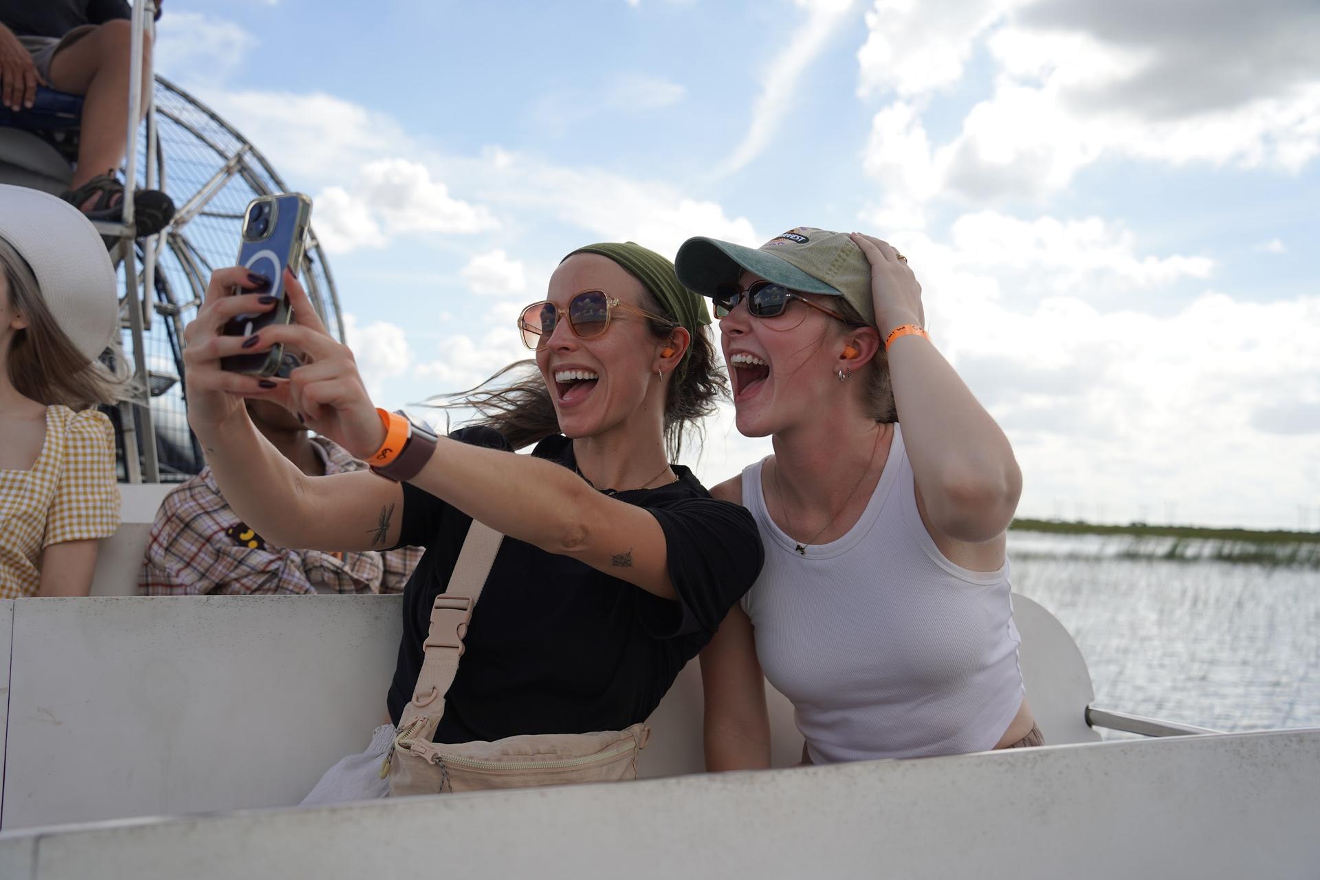 Guests take a selfie on an Everglades airboat