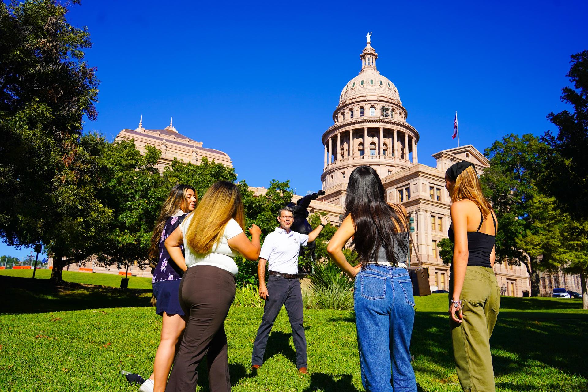 Guide and guests at the Texas State Capitol