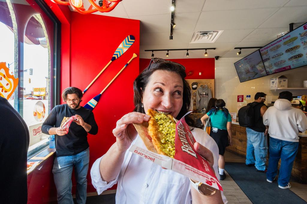 A guest with a BeaverTails pastry in Niagara Falls