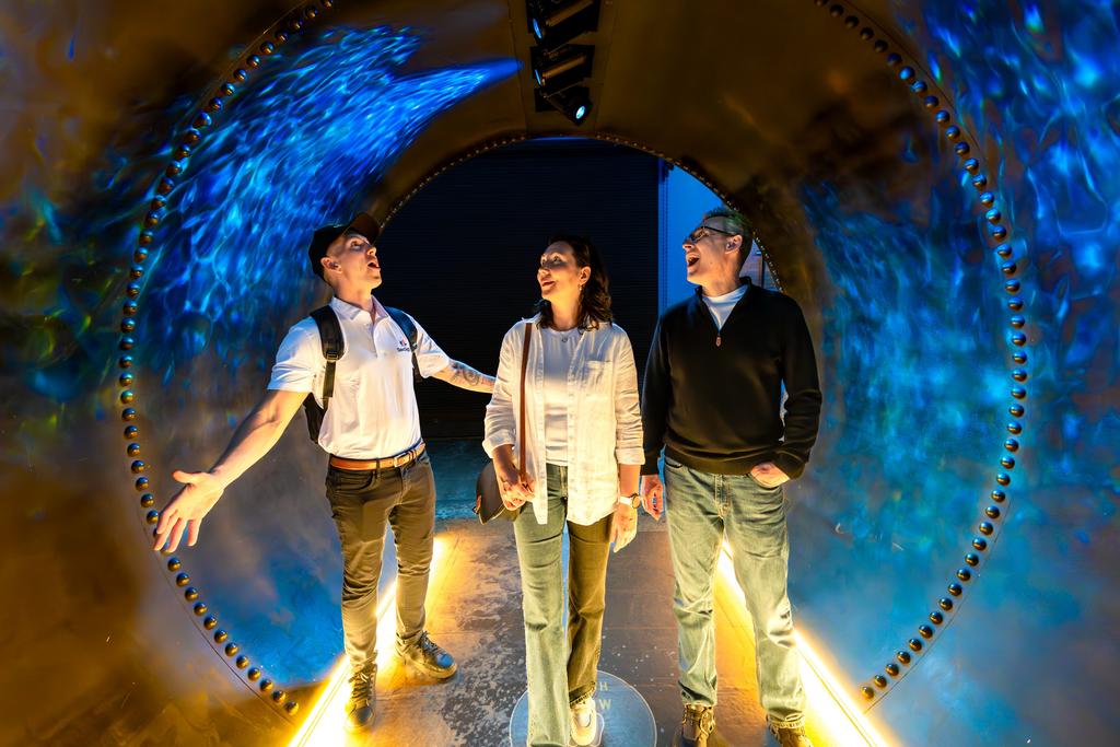 Guests and their guide inside the tunnel at the Niagara Parks Power Station