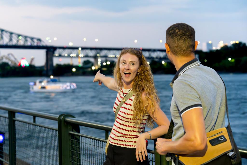 Guests on the Old Port waterfront in Montreal at dusk